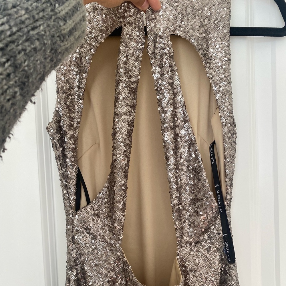 Stunning designer dress for a wedding or special occasion.